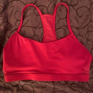 Fabletics sports bra. Medium wear, good condition. US size XS. Purple-red berry.